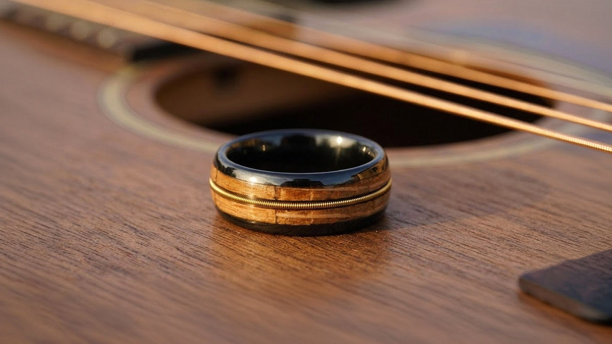 Guitar string wedding band for men in black tungsten with real guitar string inlay