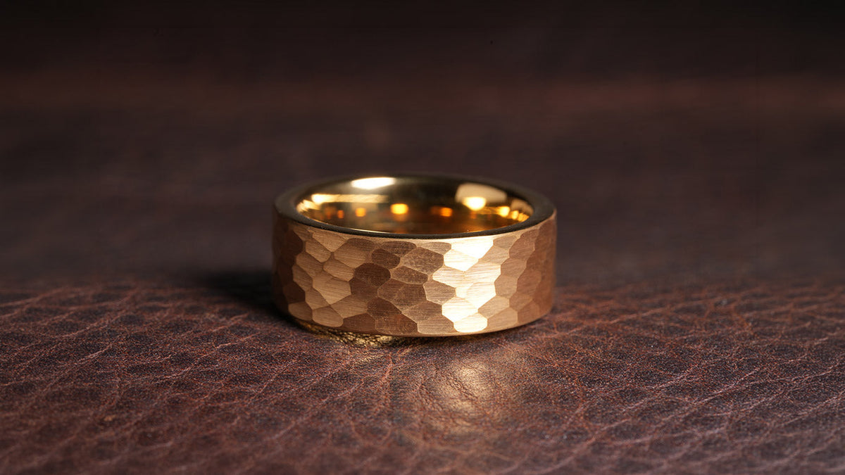 Men's tungsten wedding bands collection — black, silver, hammered and inlay styles