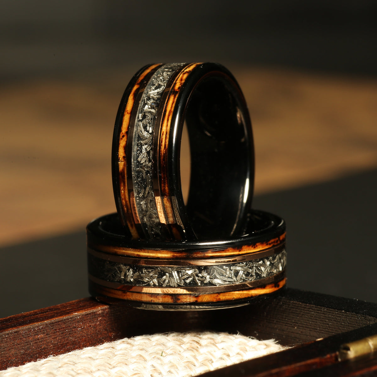 Rovalt whiskey barrel meteorite wedding band with black tungsten carbide