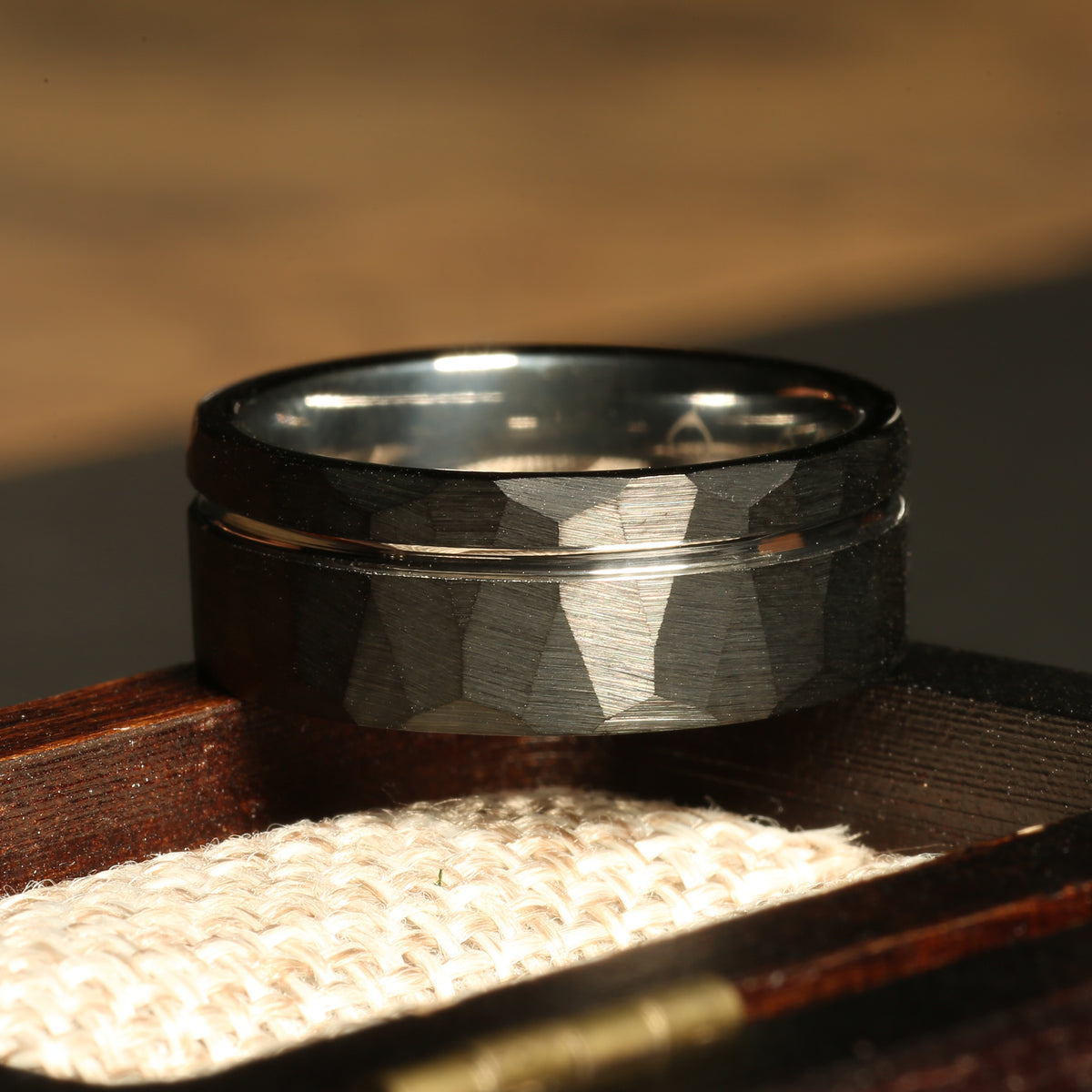 Black hammered tungsten ring for men with silver interior