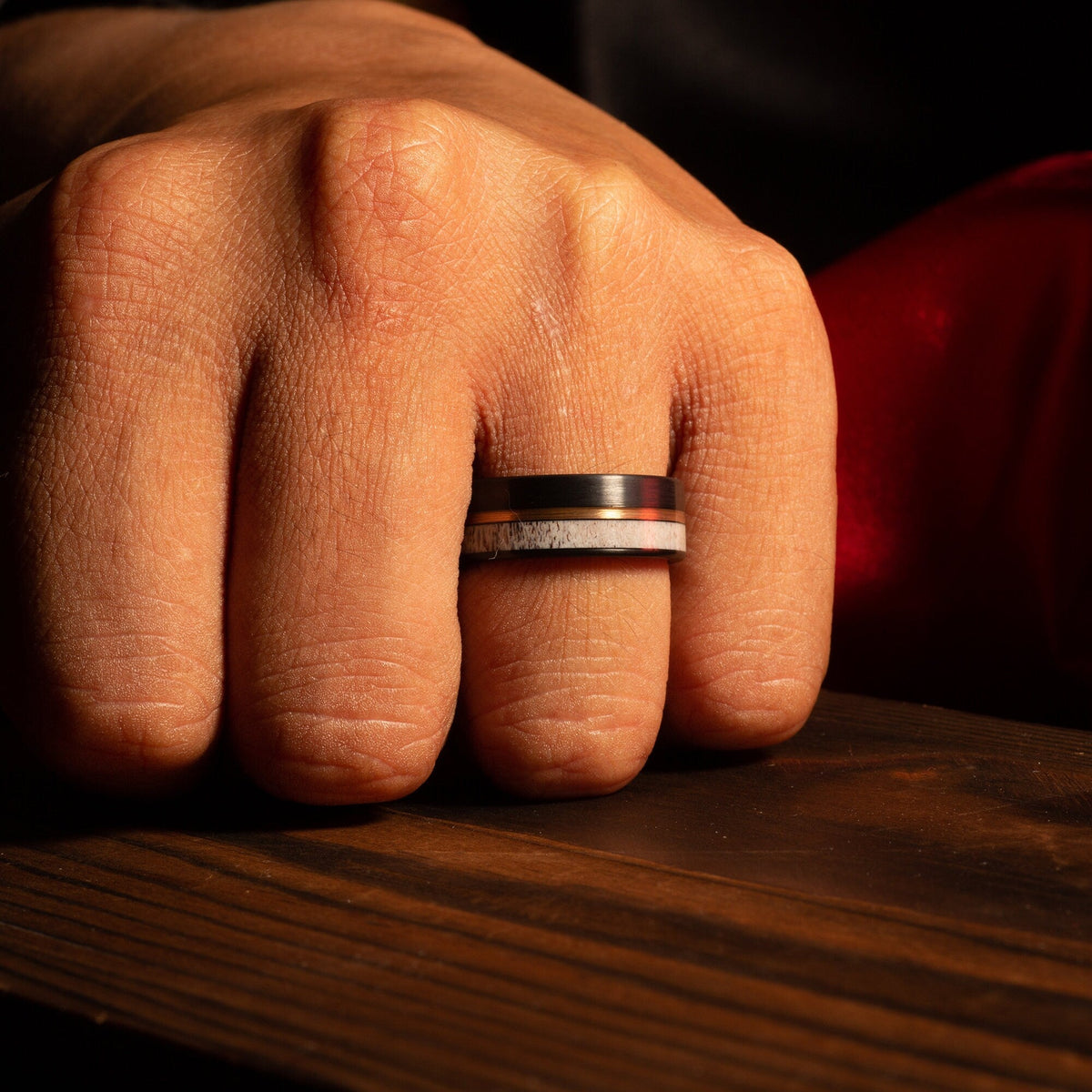 Brushed black tungsten antler wedding band for men with rose gold