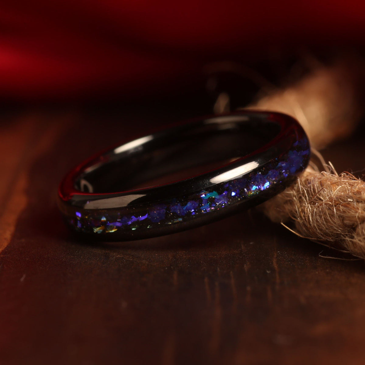 Domed blue sandstone ring for women with polished black tungsten