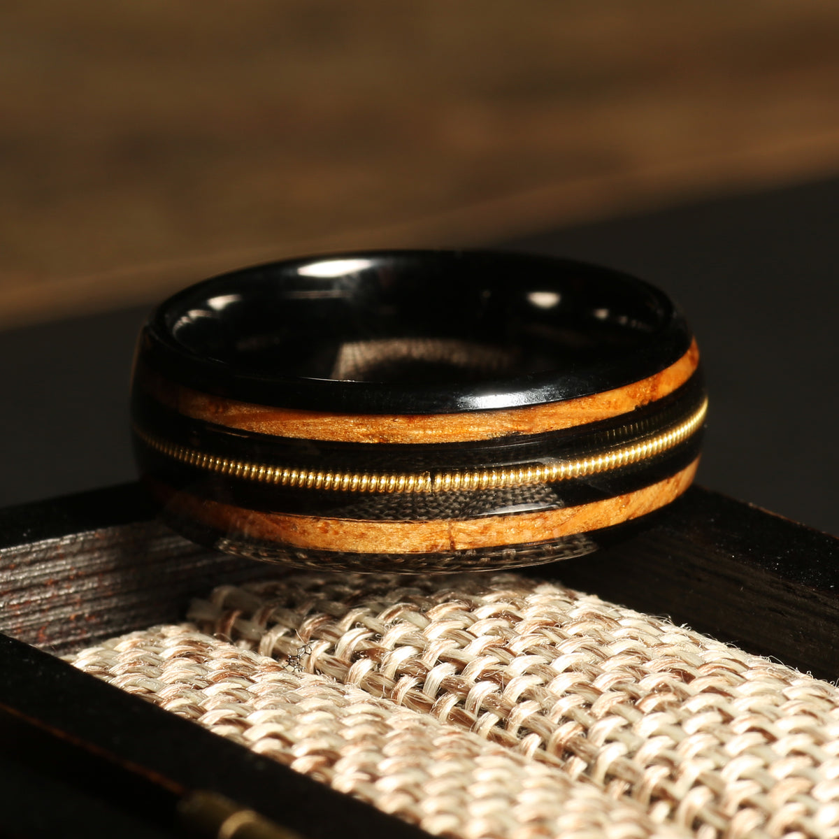 Domed whiskey barrel guitar string ring for men with black tungsten