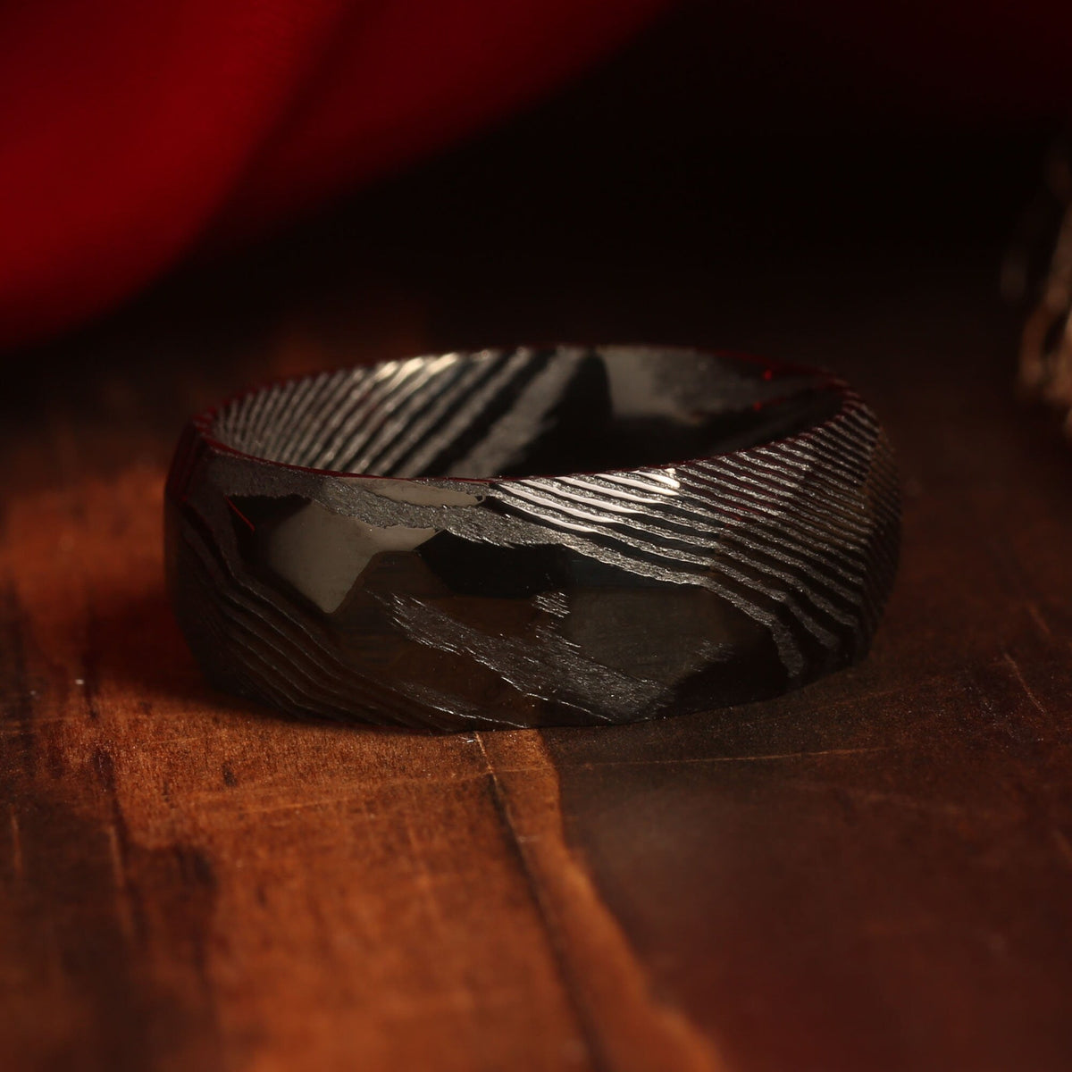 Hammered black Damascus ring for men with rugged texture