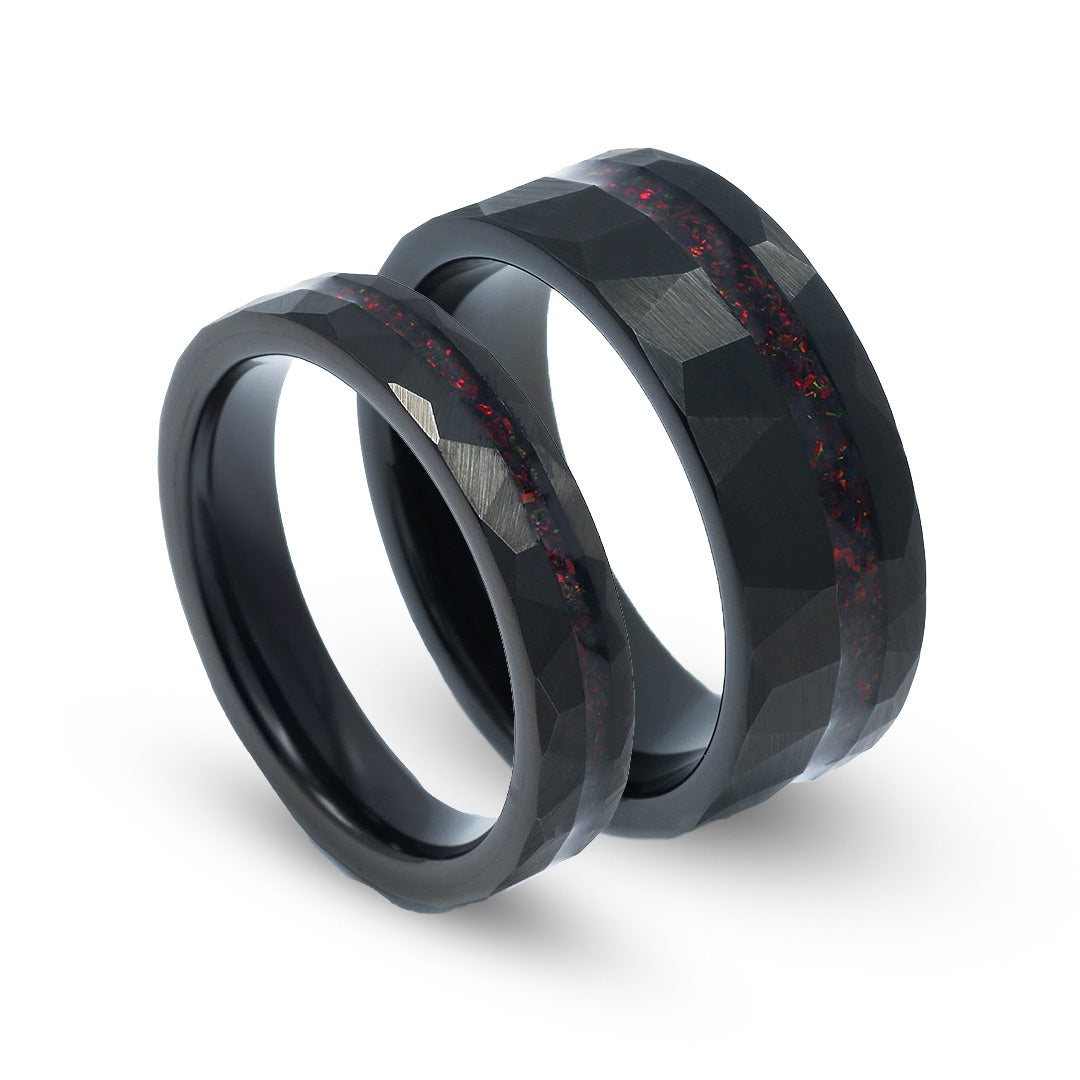 His and hers black tungsten red opal rings with modern contrast