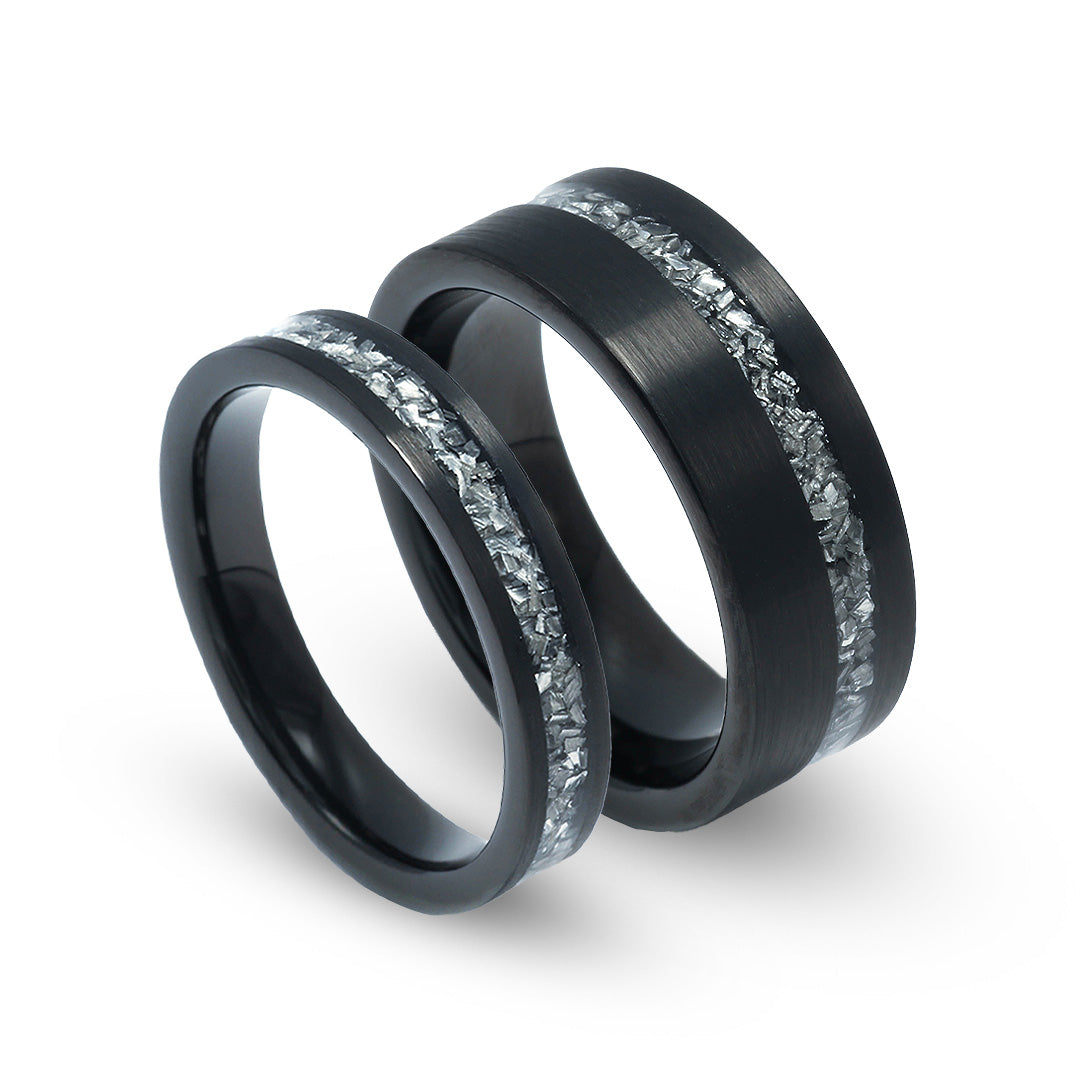 His and hers black brushed meteorite bands with genuine rare inlays