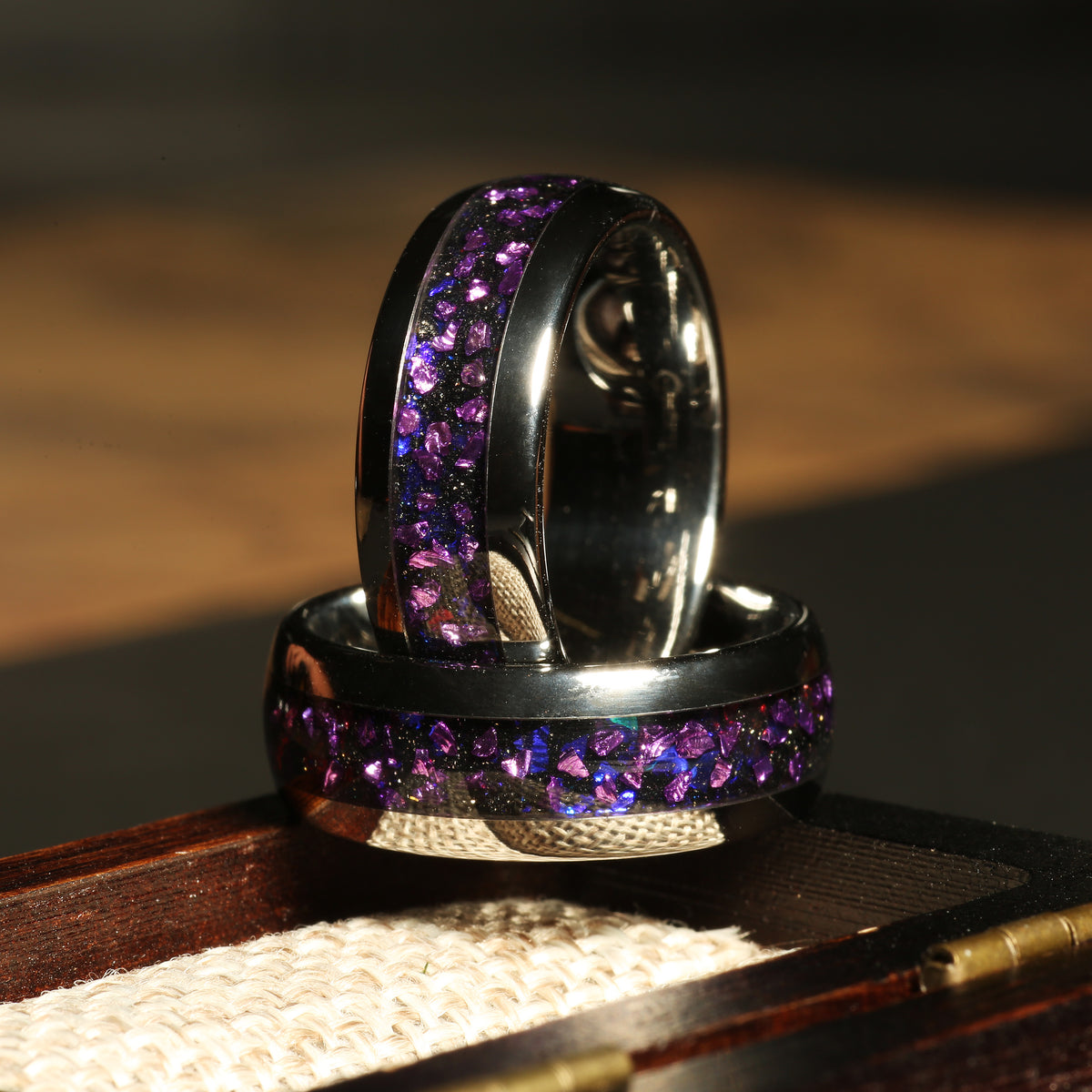 Men’s blue opal alexandrite wedding band with polished silver tungsten