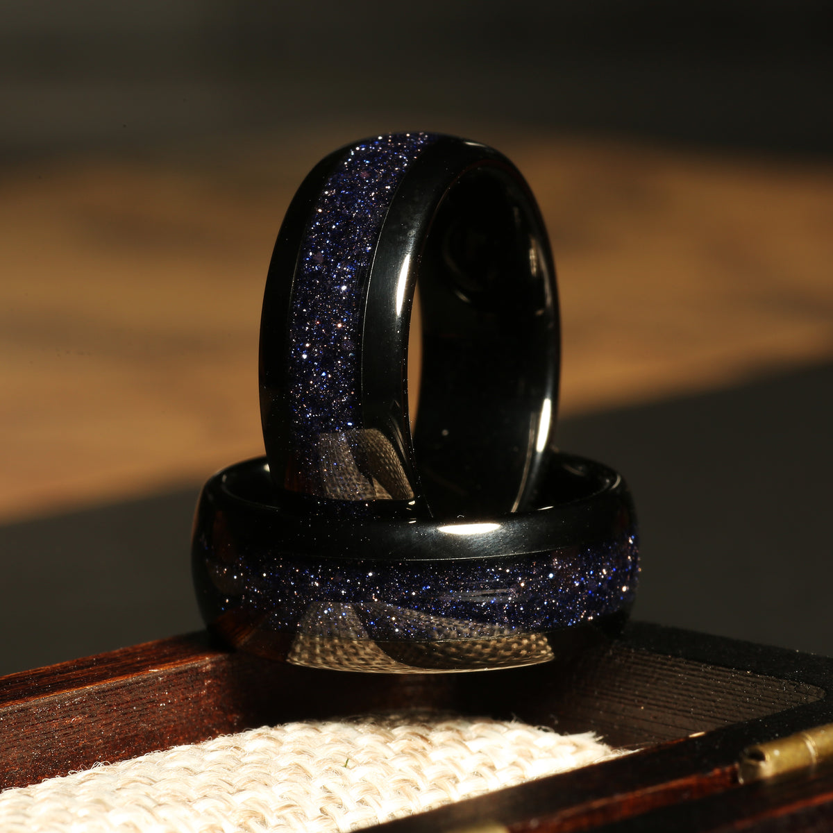 Men’s galaxy blue sandstone wedding band with black tungsten