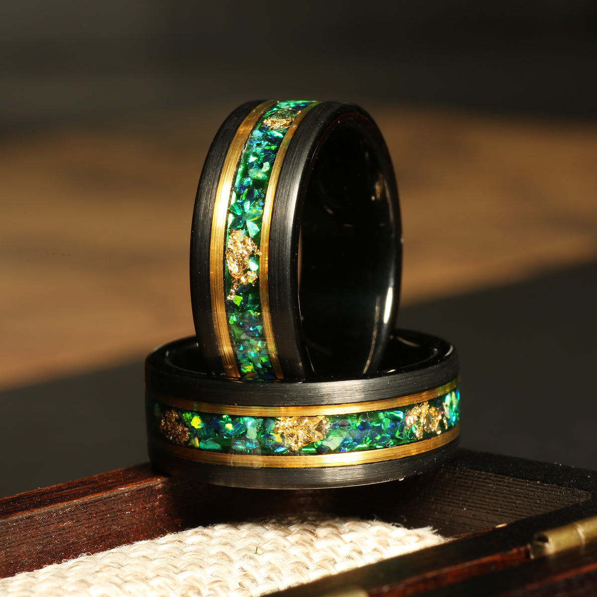 Men’s green garnet meteorite wedding band with yellow gold tungsten