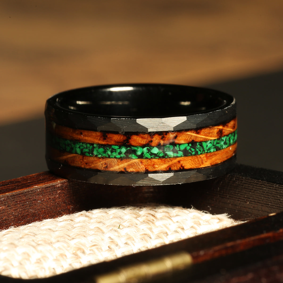 Men’s malachite whiskey barrel wedding band with black hammered tungsten