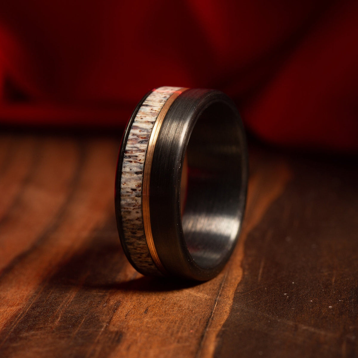 Men’s outdoorsman deer antler wedding ring with rose gold detail
