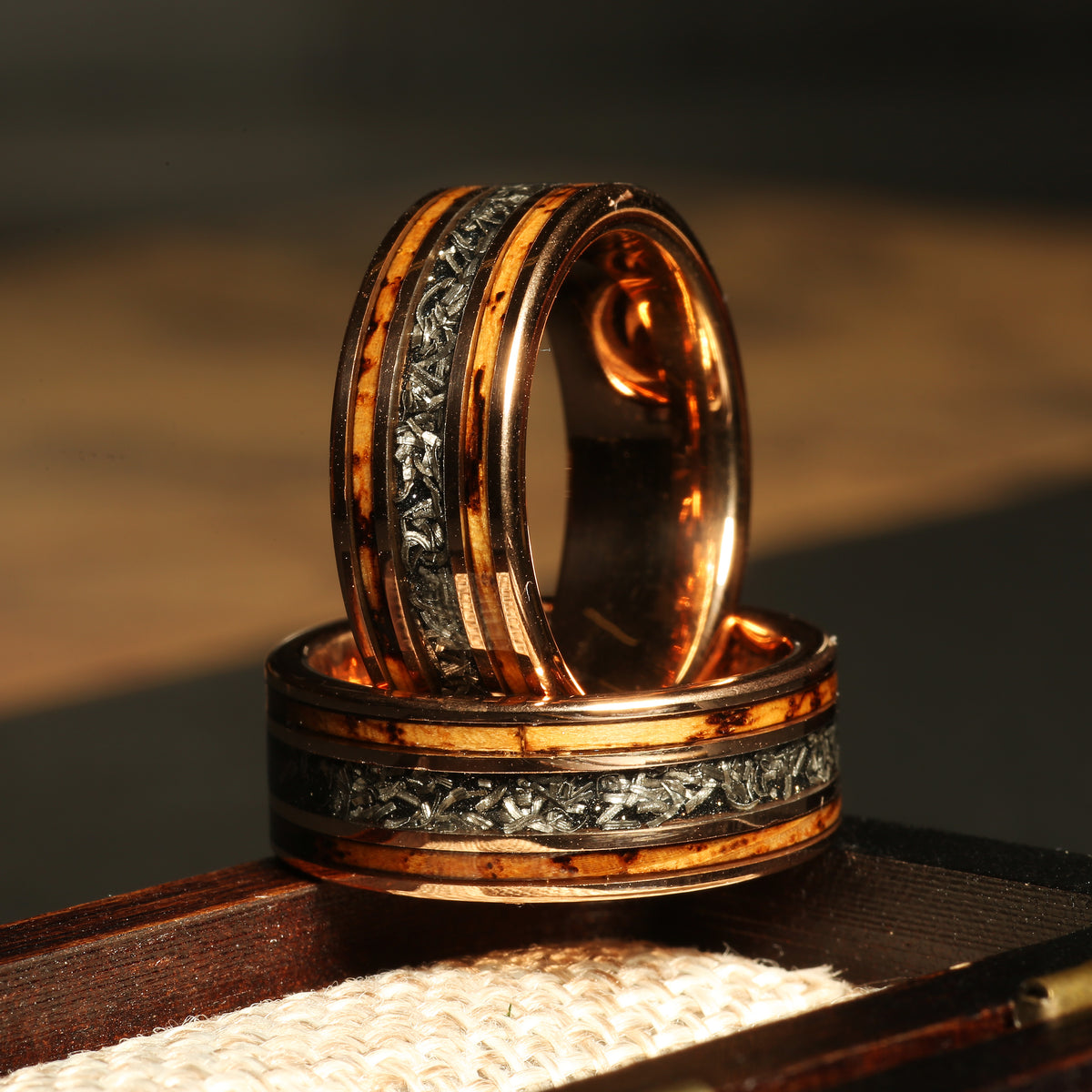 Men’s whiskey barrel meteorite wedding band with rose gold tungsten