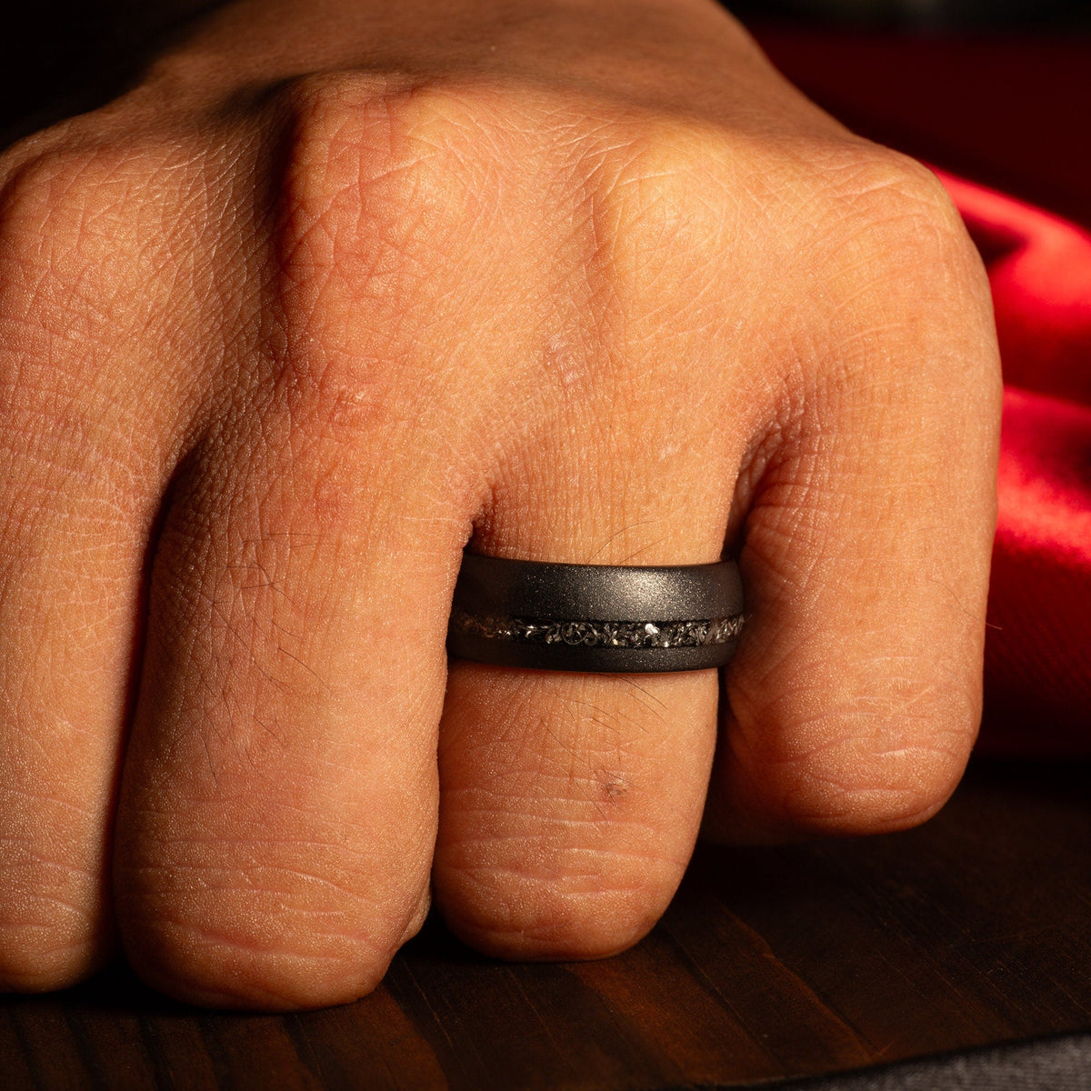 Meteorite black tungsten ring with rose gold interior for men
