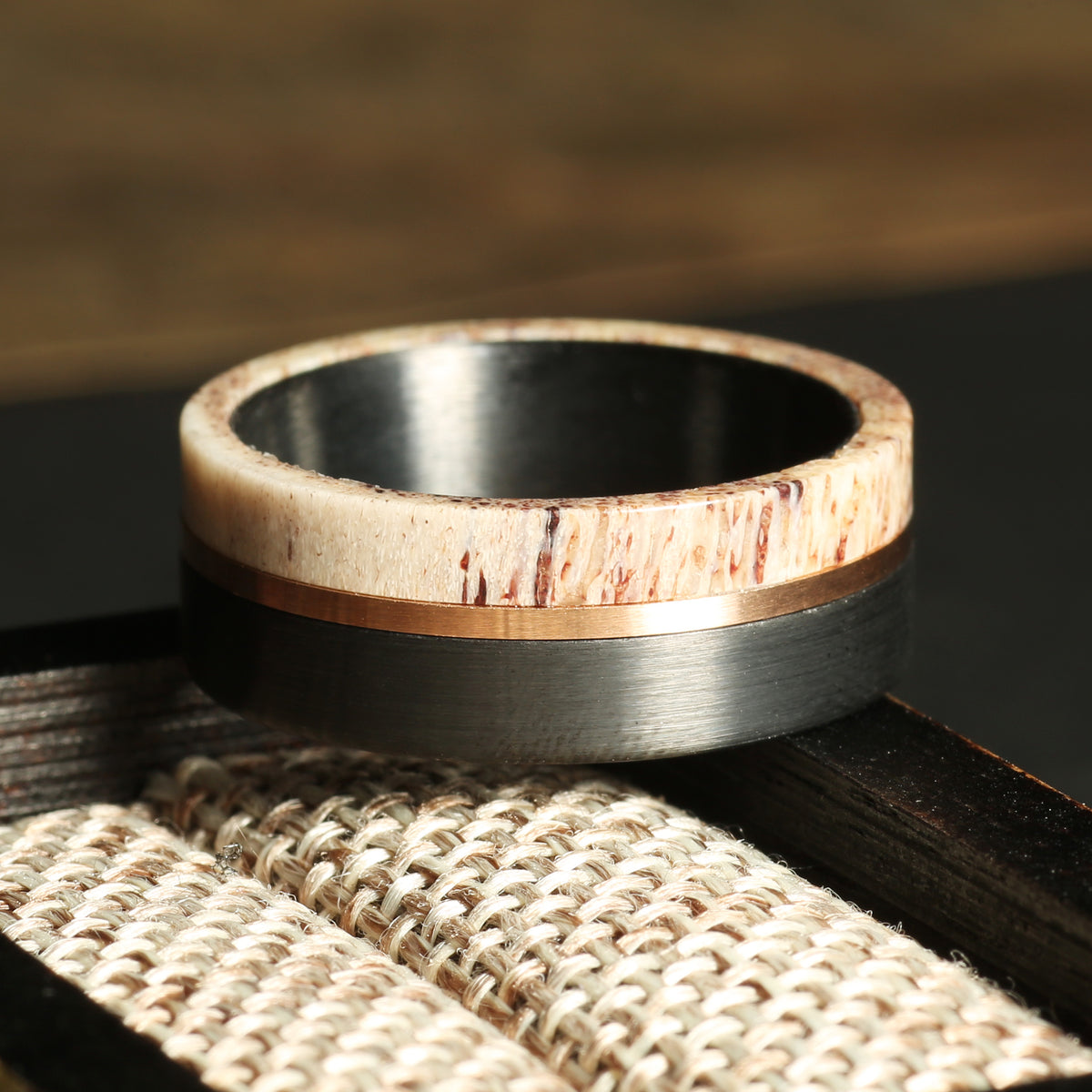 Outdoor inspired matching wedding band set with deer antler inlay