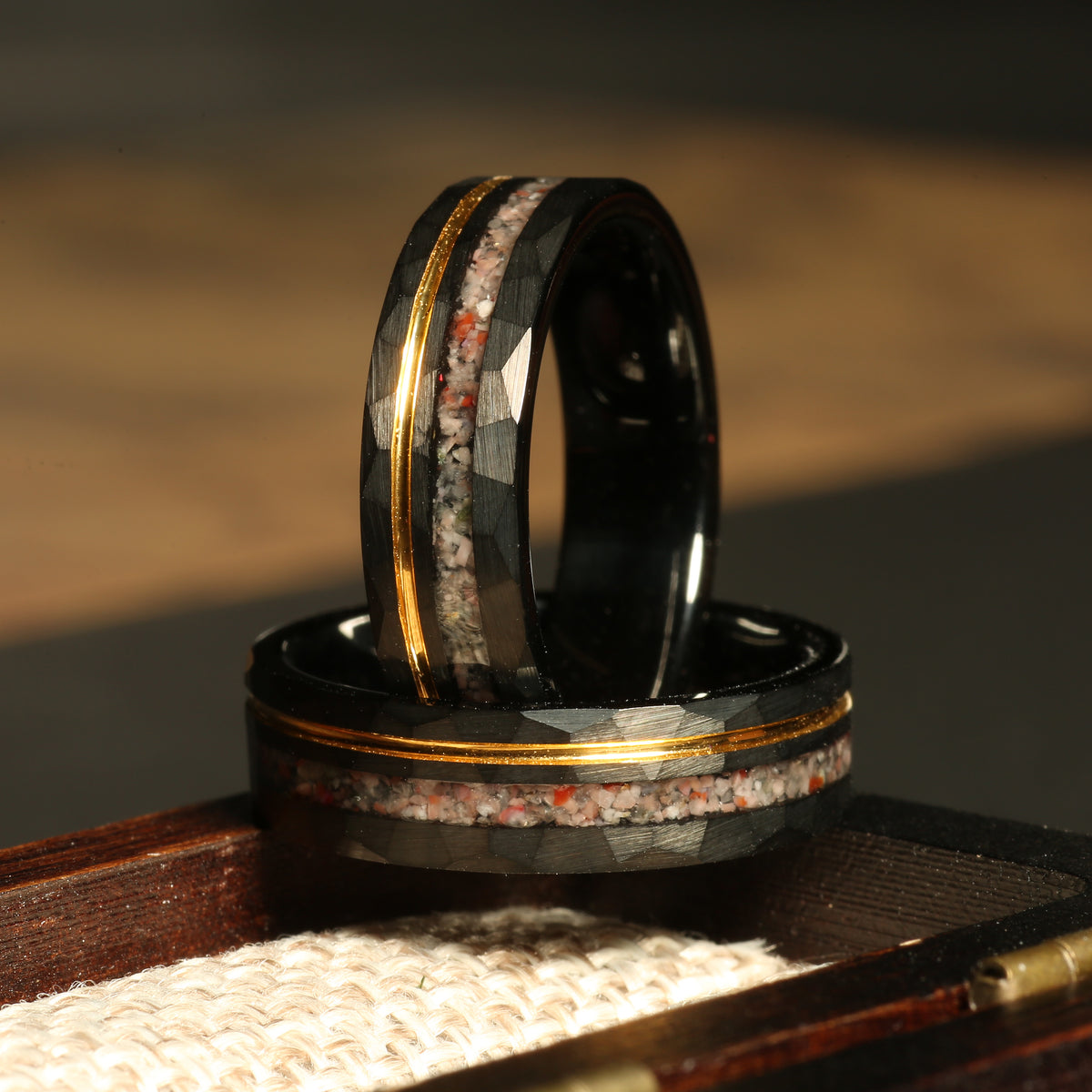 Pink sand gold strip wedding band with hammered black tungsten