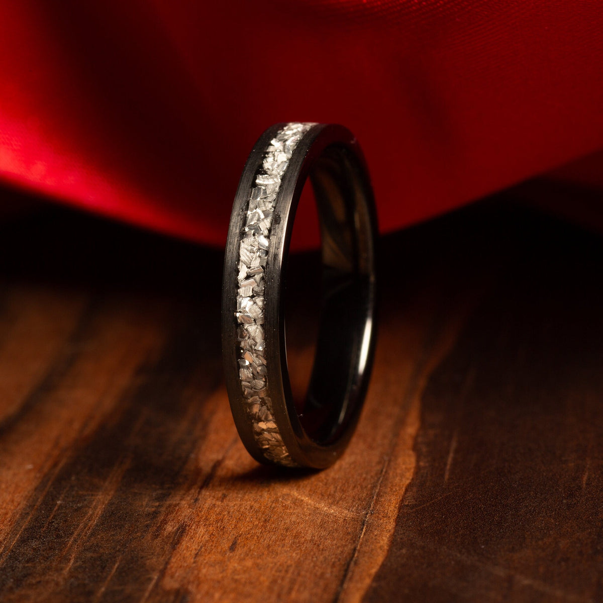 Women’s brushed black tungsten ring with meteorite detail