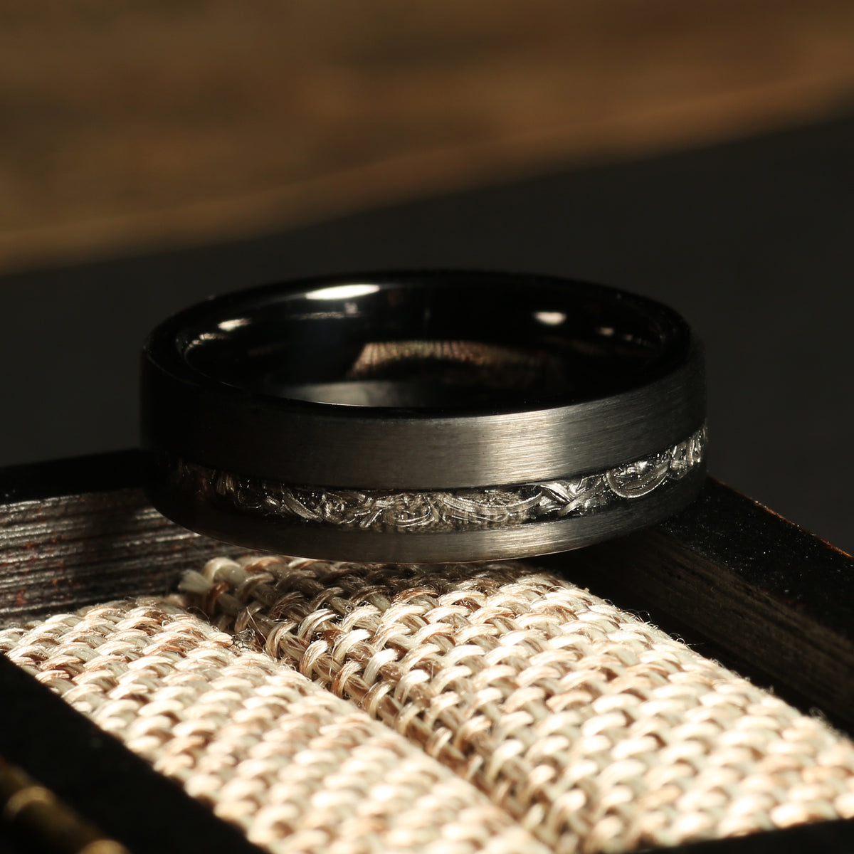 Women’s meteorite obsidian ring with brushed black tungsten